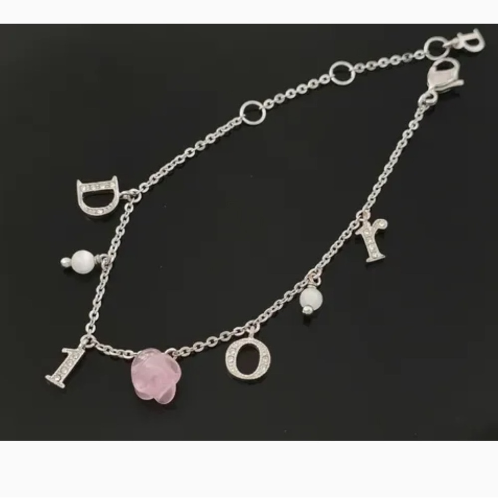 Christian Dior Silver Rose Motif and Rhinestone Logo
Bracelet - Picture 10 of 10